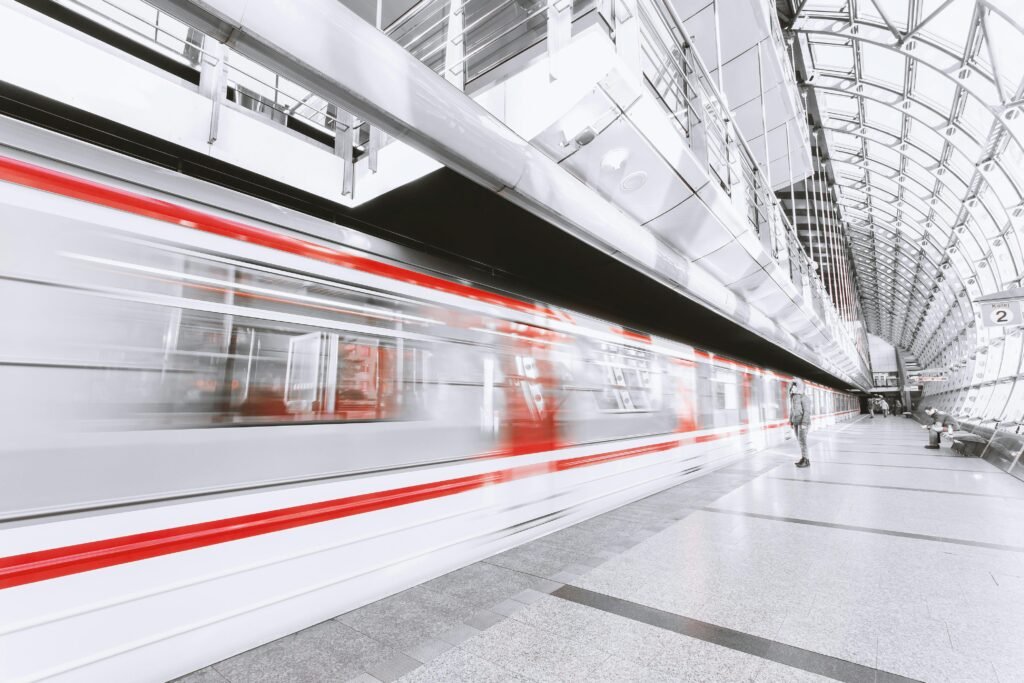 pexels-photo-253647-253647 Blurred high-speed train in a sleek modern station, capturing urban commuting and motion.